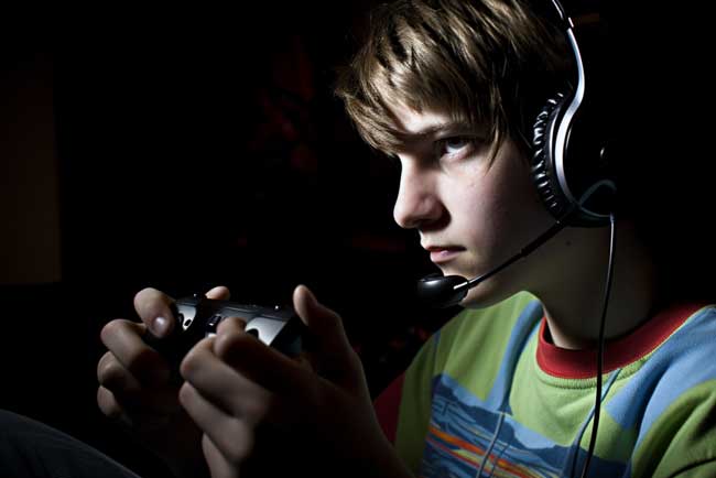 teen playing video games